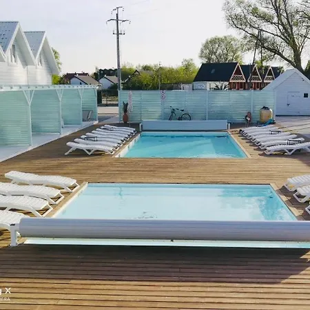 Vakantiehuis Destino Wakacyjne Domki-dwa Podgrzewane Baseny-drink Bar Mielno (Koszalin)